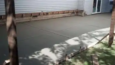Large Backyard Patio in Bothell, WA by Down Right Concrete