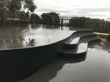 Tulalip California Curve Patio & Wraparound Steps in Tulalip, WA by Down Right Concrete