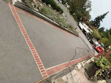 Brick-Border Sidewalk at Neighborhood Entrance by Down Right Concrete, Puget Sound area