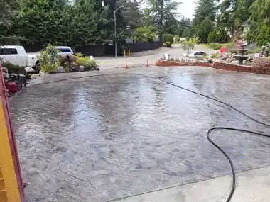 Stamped Driveway, Stone Walls & Exposed Steps by Down Right Concrete, Puget Sound area